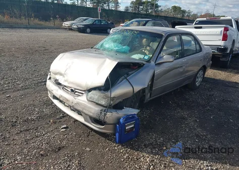 2001 Toyota Corolla Le z USA, uszkodzony, nr VIN 2T1BR12E61C501771